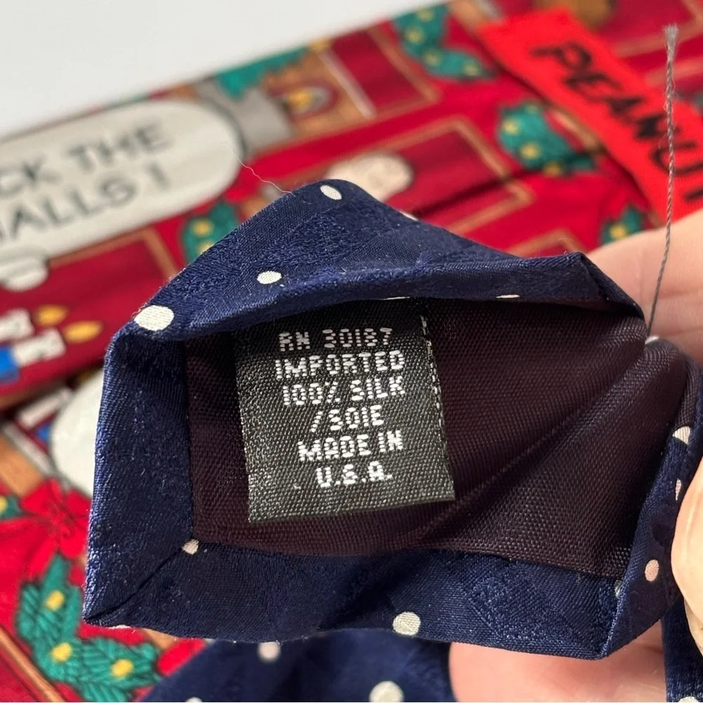 Festive Peanuts Deck the Halls Silk Tie. Just in time for the holidays.